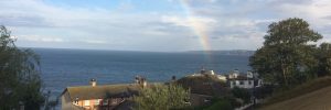 Header image showing a rainbow over Scarborough south bay